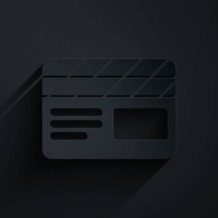 Paper cut Movie clapper icon isolated on black background. Film clapper board. Clapperboard sign. Cinema production or media industry. Paper art style. Vector Illustrationのイラスト素材