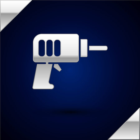 Silver Electric drill machine icon isolated on dark blue background. Repair tool. Vectorのイラスト素材