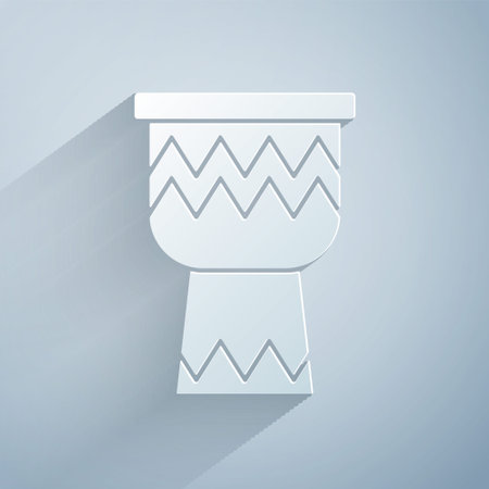 Paper cut Drum icon isolated on grey background. Music sign. Musical instrument symbol. Paper art style. Vectorのイラスト素材
