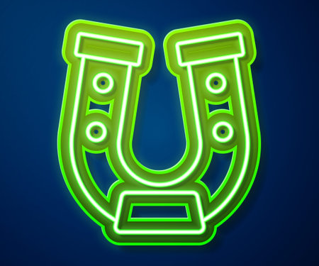 Glowing neon line Horseshoe icon isolated on blue background. Vectorのイラスト素材