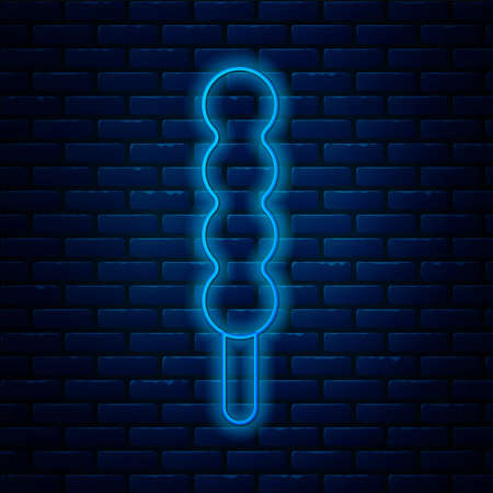 Glowing neon line Lollipop icon isolated on brick wall background. Candy sign. Food, delicious symbol. Vectorのイラスト素材