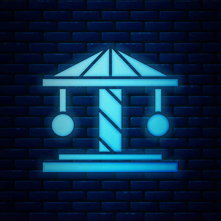 Glowing neon Attraction carousel icon isolated on brick wall background. Amusement park. Childrens entertainment playground, recreation park. Vectorのイラスト素材