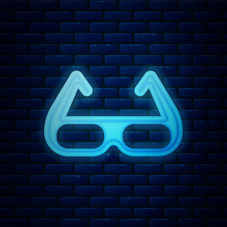 Glowing neon Sport cycling sunglasses icon isolated on brick wall background. Sport glasses icon....