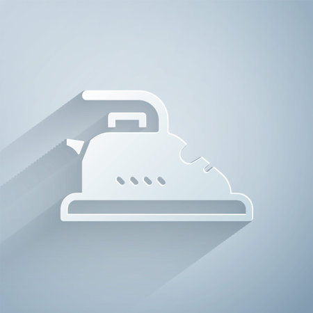 Paper cut Electric iron icon isolated on grey background. Steam iron. Paper art style. Vectorのイラスト素材