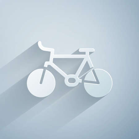 Paper cut Bicycle icon isolated on grey background. Bike race. Extreme sport. Sport equipment. Paper art style. Vectorのイラスト素材