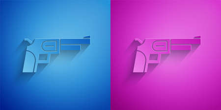 Paper cut Revolver gun icon isolated on blue and purple background. Paper art style. Vectorのイラスト素材