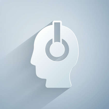 Paper cut Freelancer icon isolated on grey background. Freelancer man working on laptop at his house. Online working, distant job concept. Paper art style. Vectorのイラスト素材