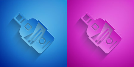 Paper cut Whiskey bottle icon isolated on blue and purple background. Paper art style. Vectorのイラスト素材
