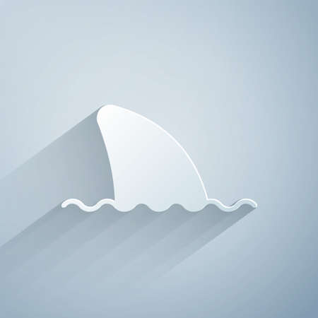 Paper cut Shark fin in ocean wave icon isolated on grey background. Paper art style. Vectorのイラスト素材