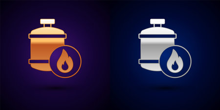 Gold and silver Propane gas tank icon isolated on black background. Flammable gas tank icon. Vectorのイラスト素材