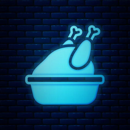 Glowing neon Roasted turkey or chicken icon isolated on brick wall background. Vectorのイラスト素材