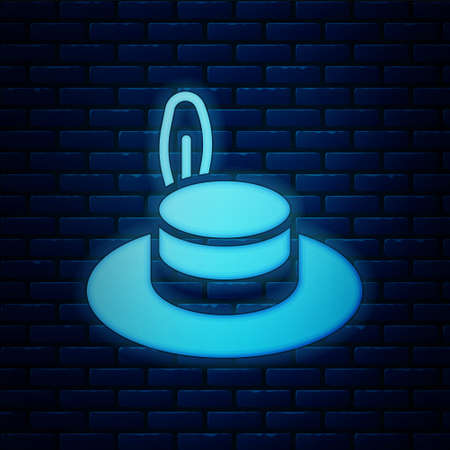 Glowing neon Man hat with ribbon icon isolated on brick wall background. Vectorのイラスト素材