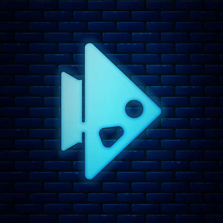 Glowing neon Fish icon isolated on brick wall background. Vectorのイラスト素材