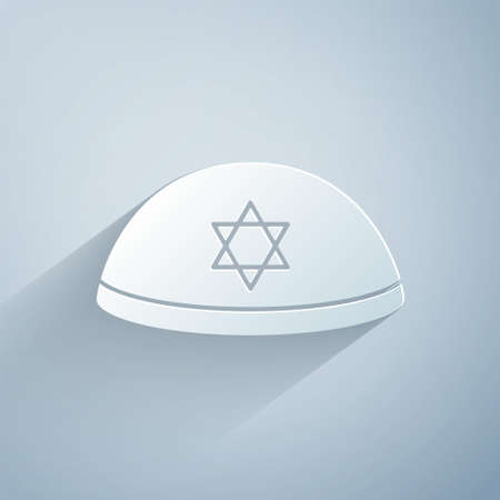 Paper cut Jewish kippah with star of david icon isolated on grey background. Jewish yarmulke hat. Paper art style. Vectorのイラスト素材