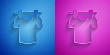 Paper cut Drying clothes icon isolated on blue and purple background. Clean shirt. Wash clothes on a rope with clothespins. Clothing care and tidiness. Paper art style. Vectorのイラスト素材