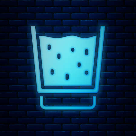 Glowing neon Glass with water icon isolated on brick wall background. Soda glass. Vectorのイラスト素材