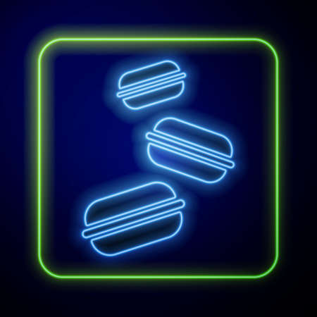 Glowing neon Macaron cookie icon isolated on blue background. Macaroon sweet bakery. Vectorのイラスト素材