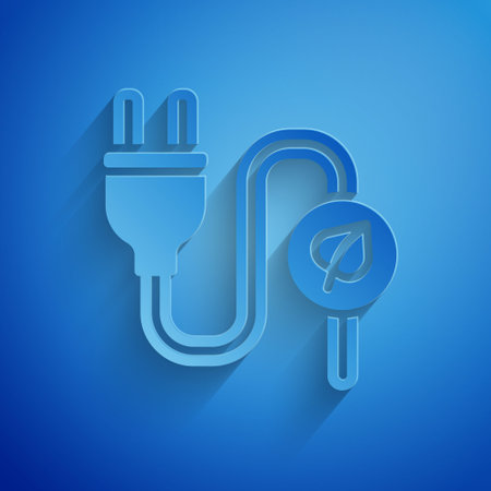 Paper cut Electric saving plug in leaf icon isolated on blue background. Save energy electricity. Environmental protection. Bio energy. Paper art style. Vectorのイラスト素材