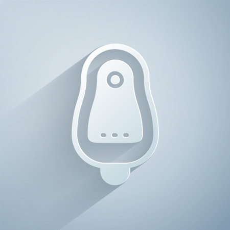 Paper cut Toilet urinal or pissoir icon isolated on grey background. Urinal in male toilet. Washroom, lavatory, WC. Paper art style. Vectorのイラスト素材