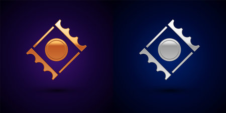 Gold and silver Condom in package safe sex icon isolated on black background. Safe love symbol. Contraceptive method for male. Vectorのイラスト素材