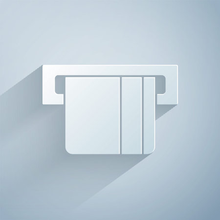 Paper cut Credit card inserted in card reader icon isolated on gray background. ATM cash machine. Paper art style. Vector.のイラスト素材