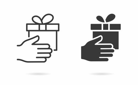 Gift in hand icon. Vector illustration.のイラスト素材