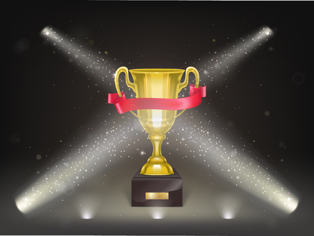 Vector 3d realistic cup on pedestal with red ribbon on stage. Golden trophy on scene in projector s lights and confetti. Shiny gold metal goblet. Reward, prize isolated on black background.のイラスト素材