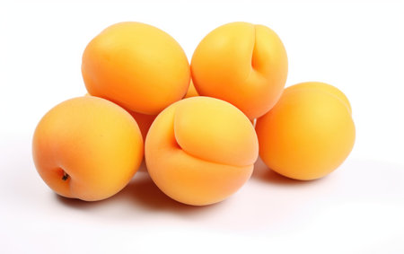 Apricots Arranged on a White Backgroundの素材