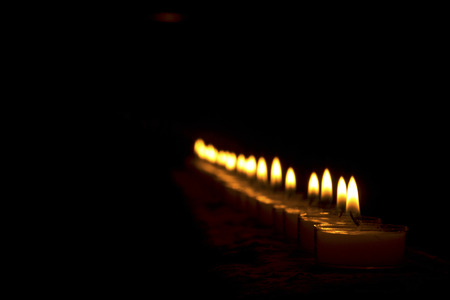 candles raw in darkの写真素材