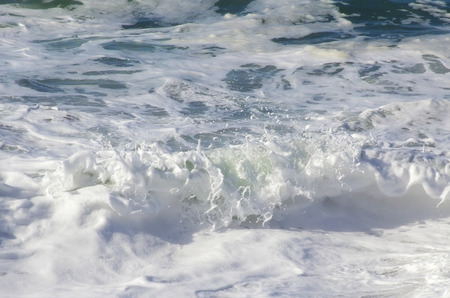 ocean white foam waves backgroundの写真素材