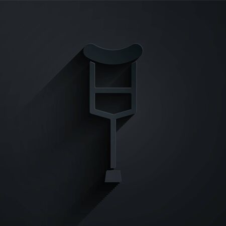 Paper cut Crutch or crutches icon isolated on black background. Equipment for rehabilitation of people with diseases of musculoskeletal system. Paper art style. Vector Illustrationのイラスト素材