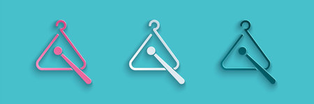 Paper cut Triangle musical instrument icon isolated on blue background. Paper art style. Vector...