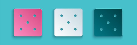 Paper cut Game dice icon isolated on blue background. Casino gambling. Paper art style. Vector...