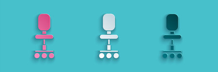 Paper cut Office chair icon isolated on blue background. Paper art style. Vector Illustration