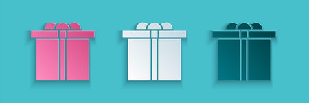 Paper cut Gift box icon isolated on blue background. Happy Birthday. Paper art style. Vector...