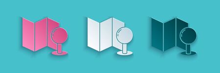 Paper cut Folded map with push pin icon isolated on blue background. Paper art style. Vector Illustrationのイラスト素材