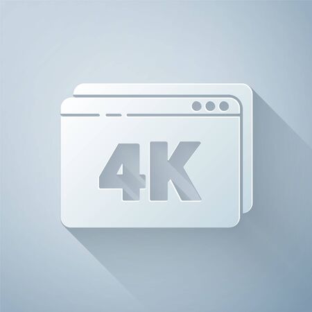 Paper cut Online play video with 4k Ultra HD video technology icon isolated on grey background. Film strip with play sign. Paper art style. Vector Illustrationのイラスト素材