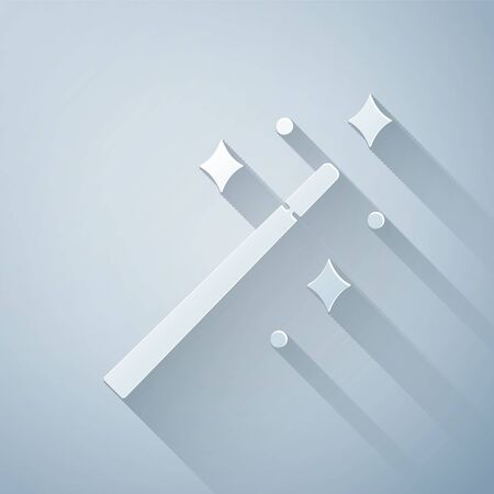 Paper cut Magic wand icon isolated on grey background. Star shape magic accessory. Magical power. Paper art style. Vector Illustrationのイラスト素材