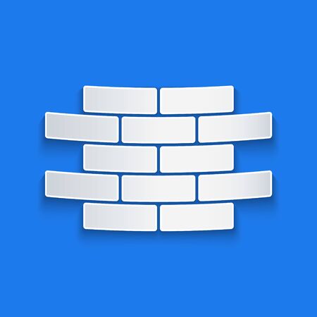 Paper cut Bricks icon isolated on blue background. Paper art style. Vector Illustrationのイラスト素材