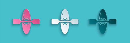 Paper cut Kayak and paddle icon isolated on blue background. Kayak and canoe for fishing and tourism. Outdoor activities. Paper art style. Vectorのイラスト素材