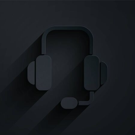 Paper cut Headphones icon isolated on black background. Support customer service, hotline, call center, faq, maintenance. Paper art style. Vector Illustrationのイラスト素材