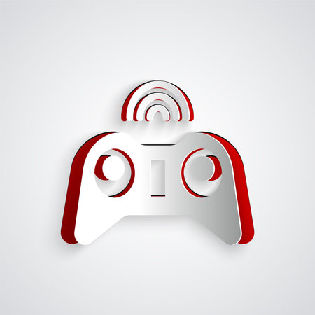 Paper cut Wireless gamepad icon isolated on grey background. Game controller. Paper art style....