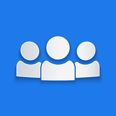 Paper cut Users group icon isolated on blue background. Group of people icon. Business avatar symbol - users profile icon. Paper art style. Vectorのイラスト素材