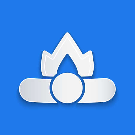 Paper cut Campfire icon isolated on blue background. Burning bonfire with wood. Paper art style. Vectorのイラスト素材