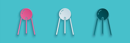 Paper cut Satellite icon isolated on blue background. Paper art style. Vector