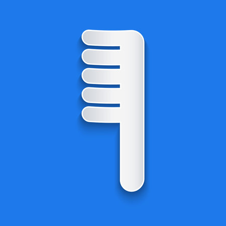 Paper cut Hairbrush icon isolated on blue background. Comb hair sign. Barber symbol. Paper art...