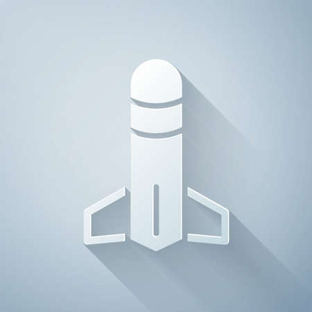 Paper cut Rocket icon isolated on grey background. Paper art style. Vectorのイラスト素材