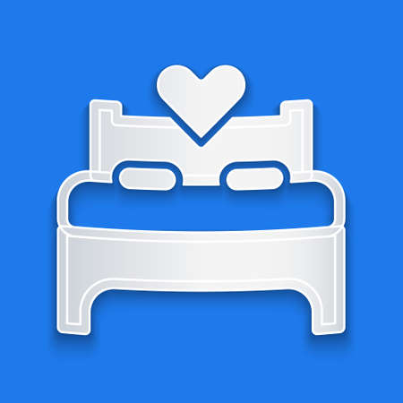 Paper cut Bedroom icon isolated on blue background. Wedding, love, marriage symbol. Bedroom creative icon from honeymoon collection. Paper art style. Vectorのイラスト素材