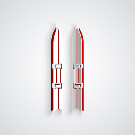 Paper cut Ski and sticks icon isolated on grey background. Extreme sport. Skiing equipment. Winter sports icon. Paper art style. Vectorのイラスト素材