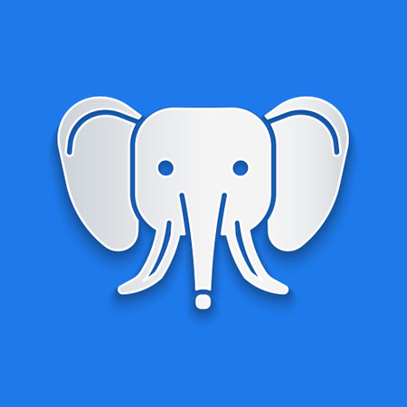 Paper cut Elephant icon isolated on blue background. Paper art style. Vectorのイラスト素材